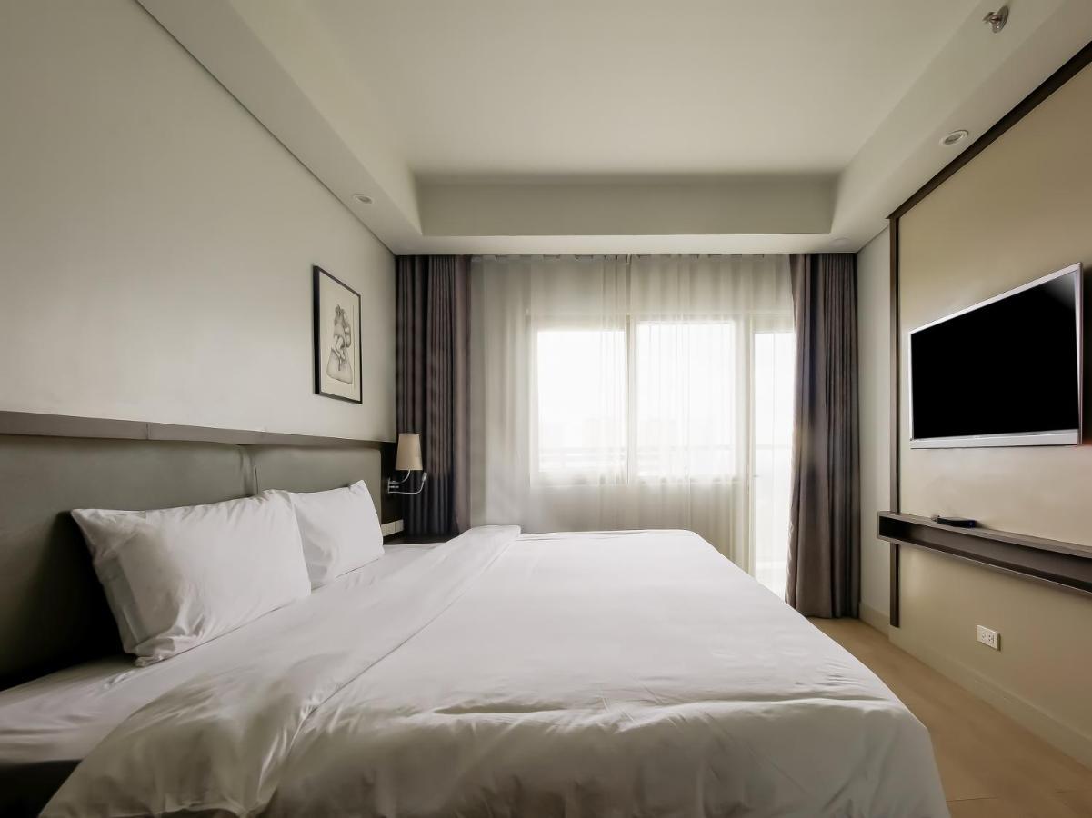 Capital O 804 The Residences At Bonifacio Civic Center 马尼拉 外观 照片