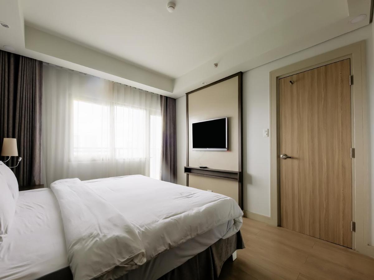 Capital O 804 The Residences At Bonifacio Civic Center 马尼拉 外观 照片