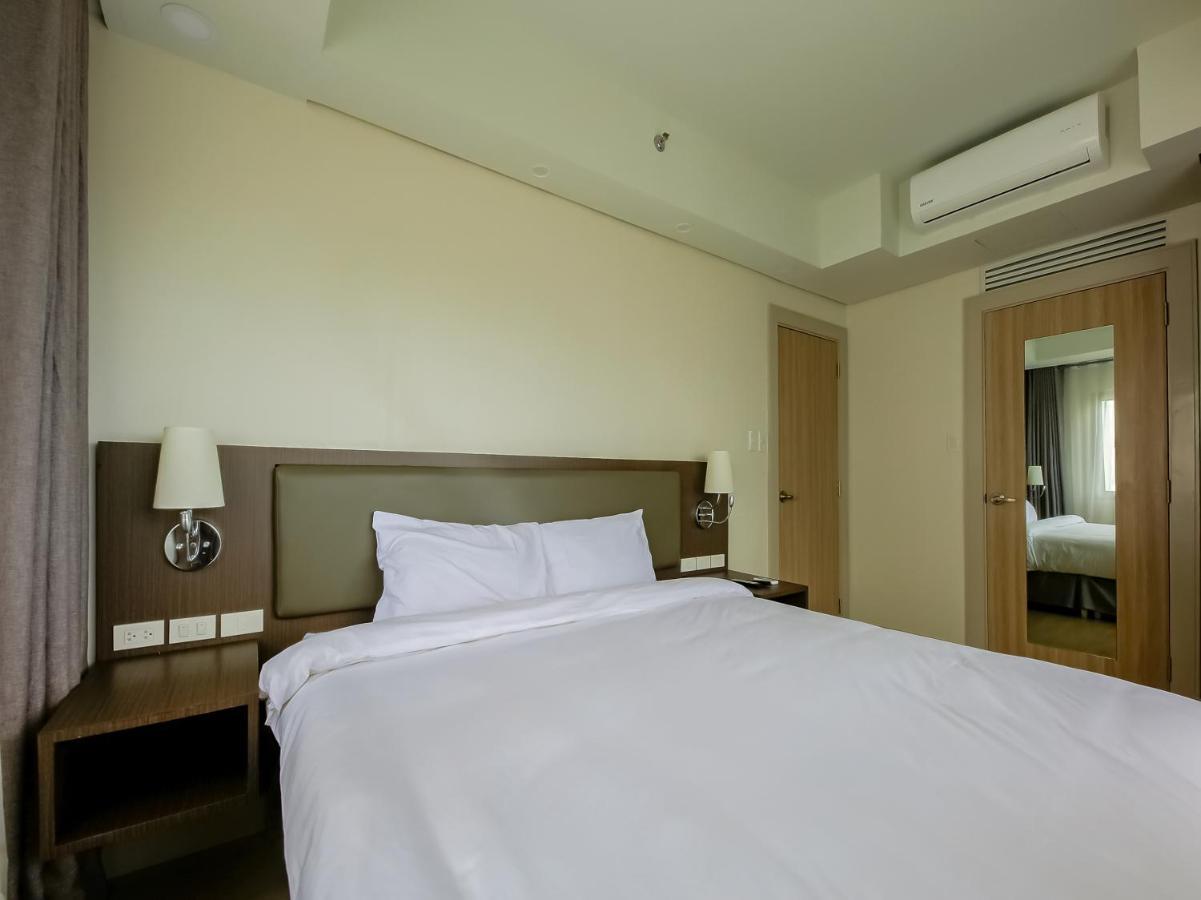 Capital O 804 The Residences At Bonifacio Civic Center 马尼拉 外观 照片